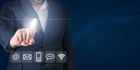 Businessman touching screen for contact us information. Contact us concept.