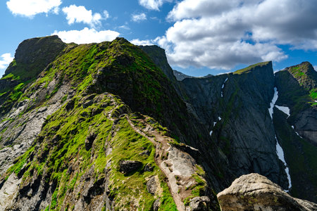 Hiking trail to top of mountain in Reine region, Lofoten islands, Norway. Beautiful Nature landscapeの写真素材