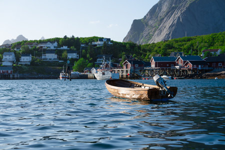 View on the small harbor of fishing village, Summer Lofoten islands, Norway.