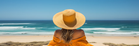 Unrecognizable woman relaxing and enjoying a blissful summer beach vacation and sun holidayの素材