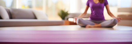 Active lifestyle woman rolling exercise mat for morning meditation yoga in living roomの素材
