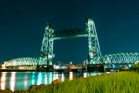 Impressive long exposure night photo of Koninginnebrug bridge in Rotterdamの写真素材