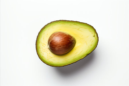 Fresh avocado slice isolated on white background, perfect for healthy eating conceptsの素材