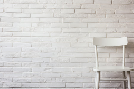 Vintage white painted brick wall texture background with weathered and aged appearanceの素材