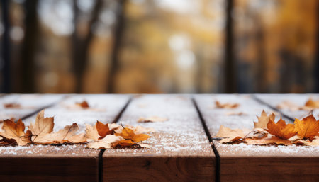 Snowy wooden table with falling snow, blurred forest background, and fall foliage. 16k ai image.の素材