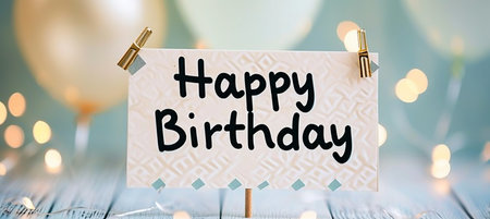 Golden balloons birthday card with magical bokeh background and  happy birthday  textの素材