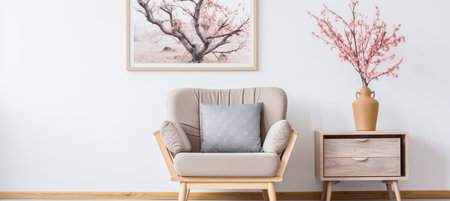 Japandi living room with grey armchair, beige loveseat, poster frames against white wallの素材
