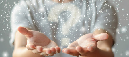 Businessman with holographic white question mark for certification or audit conceptの素材