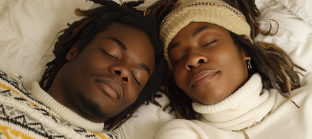 Blissful african american couple, 20, peacefully sleeping on white bed, copy space for textの素材