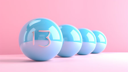 Close up of blue lottery balls on pastel background, with focus on lucky number 13の素材