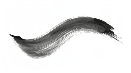 Gray paint stroke isolated on white background for artistic design projects and creativity conceptsの素材