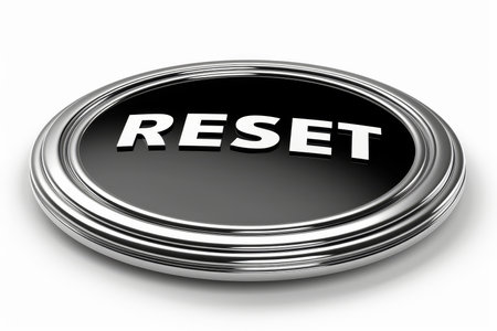 Sleek white reset button with bold  reset  text isolated on a pristine white backgroundの素材