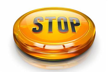 Vibrant red stop button with text isolated on a white background, perfect for emergency situations.の素材
