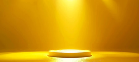 Empty white podium on yellow background with product display spotlight in abstract studio sceneの素材