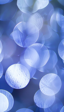 Soft delicate abstract bokeh background in dusky violet, powder blue, and silver gray colorsの素材