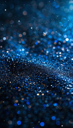 Abstract blue bokeh light background with defocused blur ideal for artistic design projectsの素材