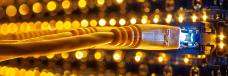 Fiber optic lan cable connected to the server switch for efficient network performanceの素材