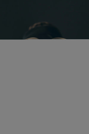 Powerful boxing glove clenched fists signifying strength and readiness in summer olympicsの素材