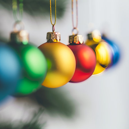 Vibrant christmas ornaments on white background   minimalist holiday decor with focus on ornamentsの素材