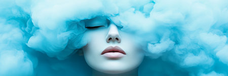 Woman With Face Surrounded By Blue Smoke, Beauty And Fashion Concept With Colorful Cloudの素材