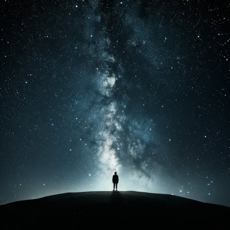 Solitude Under the Milky Way A lone figure finds tranquility amidst the vastness of the cosmos.の素材