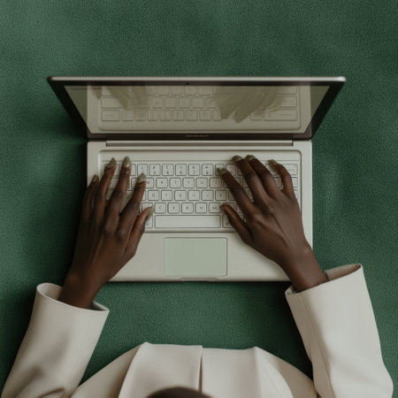 Woman Working on Laptop, Green Background. Freelancing, Remote Work, Online Business Concept.の素材