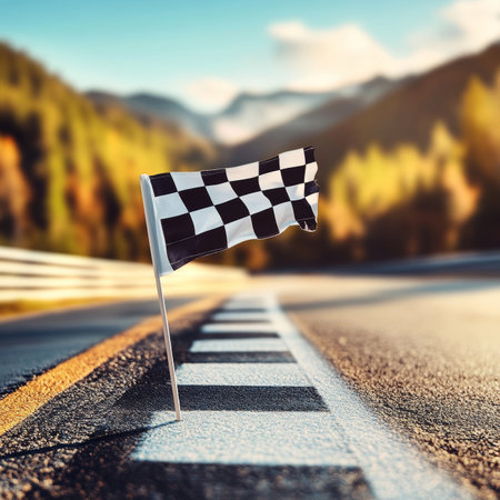 Checkered Flag Signaling Victory on Winding Mountain Road Achievement and Motorsport Conceptの素材
