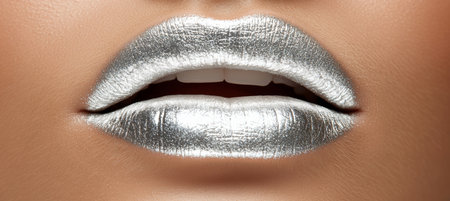 Close Up Of Womans Lips With Silver Lipstick. Concept Of Beauty, Fashion And Cosmetics.の素材