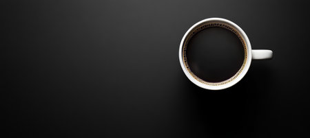 Freshly Brewed Cup of Joe. Flat Lay of a Hot Drink Against a Dark Background With Copy Spaceの素材