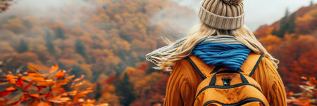 Autumn Vibes Woman with Cozy Knitwear and Backpack Exploring the Vibrant Colors of a Fall Forestの素材