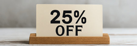Simple Beige Card Displaying 25 Off on a Wooden Stand, Minimal Design, Discount Conceptの素材