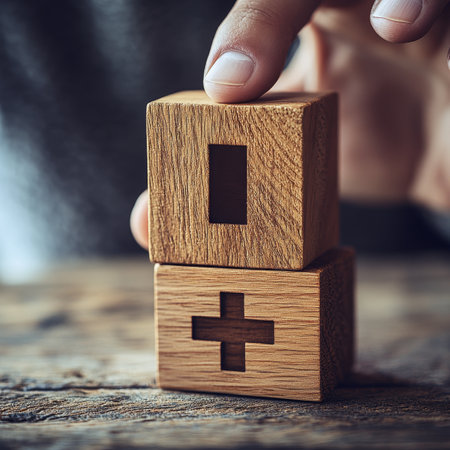 Close-Up of Wooden Number Blocks with Mathematical Symbols for Decision Making Concept.の素材