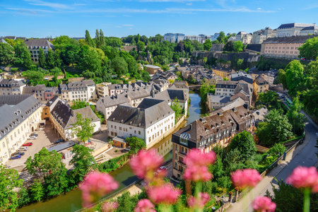 Scenic view of Grund district with old town and fortress in the background, in Luxemburgの写真素材