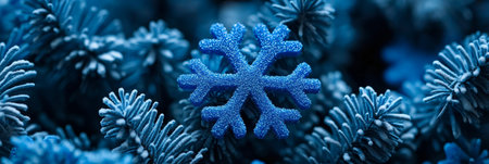 Blue Glitter Snowflake Ornament on a flocked Christmas Tree, Christmas Background, New Year card.の素材