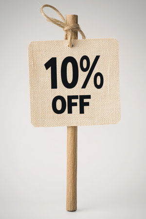 Minimalist Sale Tag 10 Off Discount Displayed on a Beige Note, Isolated on a White Backgroundの素材