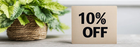 Beige Square Note Card with Black 10 Off Text and Potted Green Plant Against White Backgroundの素材