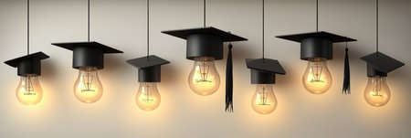Illuminating Knowledge Light Bulbs with Graduation Caps on White Background,3D Renderの素材