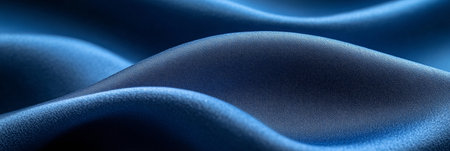 Blue fabric texture background, wavy silk material, luxury satin cloth or elegant curtain textileの素材
