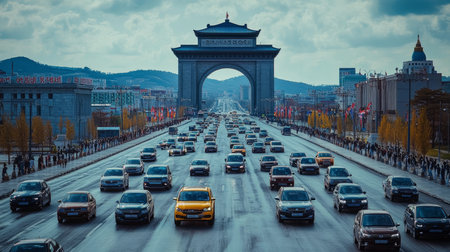 Triumphal Arch of Pyongyang, Bustling Cityscape with Heavy Traffic Under Monumental Archwayの素材