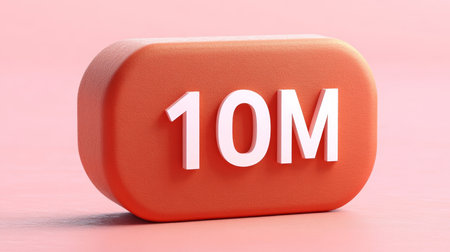 3D Render of an Orange Rounded Rectangle with 10 Million Text on Soft Pink Backgroundの素材
