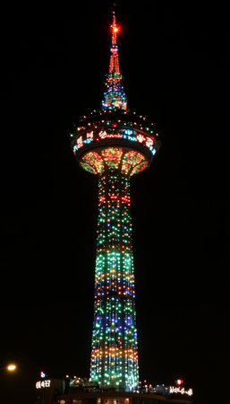 Illuminated Communication Tower with Decorative Lighting at Night in Seoul, South Koreaの素材
