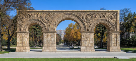 Grand Archway - Majestic Monumental Structure with Intricate Carvings and Cityscape Viewの素材