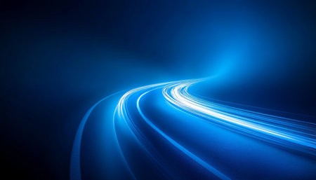 Abstract Blue Light Trails Streaking Across a Dark Background, Motion and Energy Concept.の素材