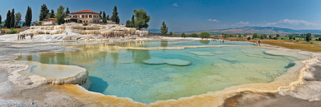 Tranquil Limestone Terraces and Clear, Blue Thermal Pools at Popular Tourist Destination in Turkeyの素材