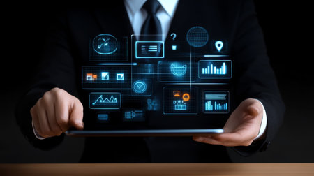 Businessman Holding Digital Tablet, Futuristic Interface, Real-Time Business Analyticsの素材