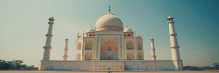 Iconic white marble monument on sunny day with clear bright daytime blue sky, Taj Mahal, Agra, Indiaの素材
