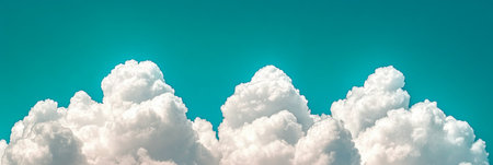Serene Bright Blue Cloudy Sky With Abstract Beautiful Cloudscape Background, Providing Copy Space.の素材