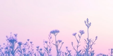 Tranquil Nature Scene Soft Pink And Blue Wildflowers Against A Pastel Sky At Sunset.の素材