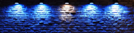 Blue Brick Wall Texture Illuminated by Dramatic Spotlights, Perfect Background for Design Projectsの素材