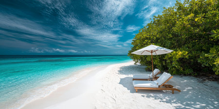 Idyllic Tropical Beach Getaway Two Lounge Chairs and Umbrella on Pristine White Sandの素材